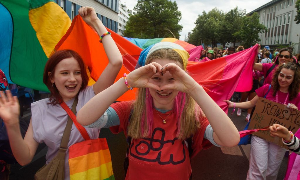 LGBTQ+ activists in Germany celebrate during a Pride protest. 
