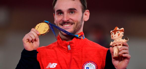 Chile's Tomás González poses on the podium with the gold medal after winning the Artistic Gymnastics Men's Floor Exercise Final during the Lima 2019 Pan-American Games in Lima, on July 30, 2019