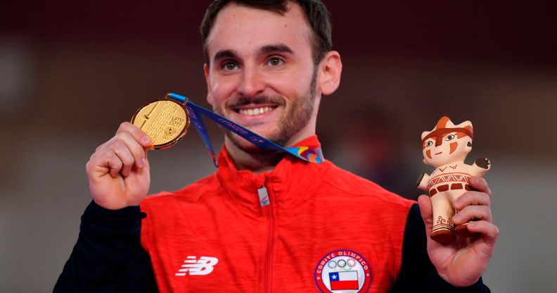 Chile's Tomás González poses on the podium with the gold medal after winning the Artistic Gymnastics Men's Floor Exercise Final during the Lima 2019 Pan-American Games in Lima, on July 30, 2019