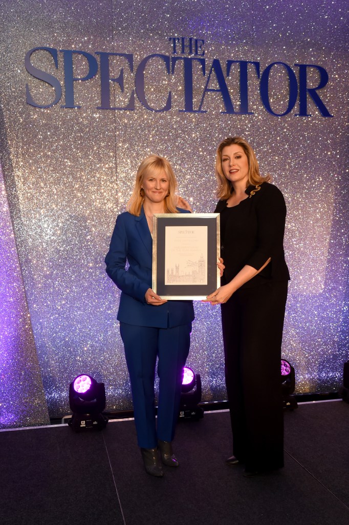 Rosie Duffield, who has been outspoken about transgender people and their rights, accepts an award from Penny Mordaunt
