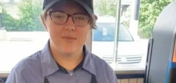 18-year-old Jacob Williamson dressed in his work uniform.