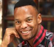 Strictly star Johannes Radebe has opened up about experiencing homophobic bullying in his youth.