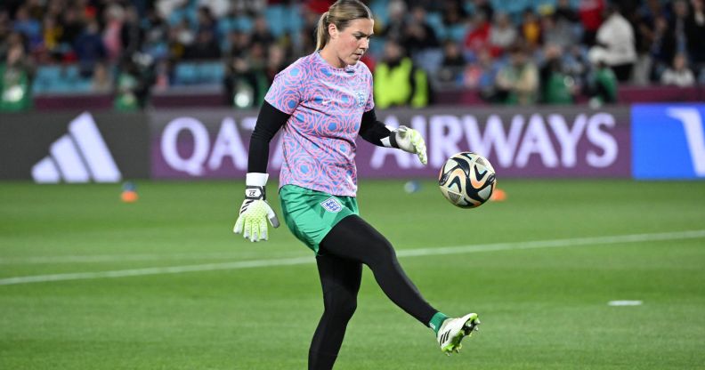 England goalkeeper Mary Earps kicks a football in an action shot