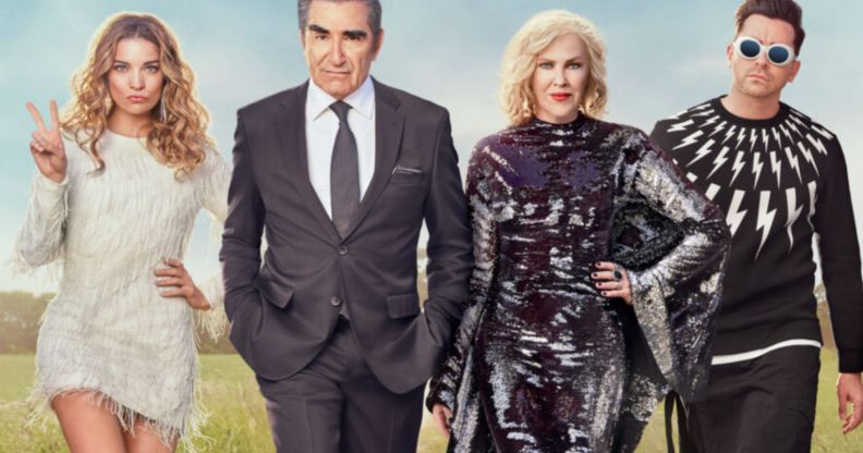 A promotional photo of Eugene Levy as Johnny Rose, Catherine O'Hara as Moira Rose, Daniel Levy as David Rose, Annie Murphy as Alexis Rose in Schitt's Creek.