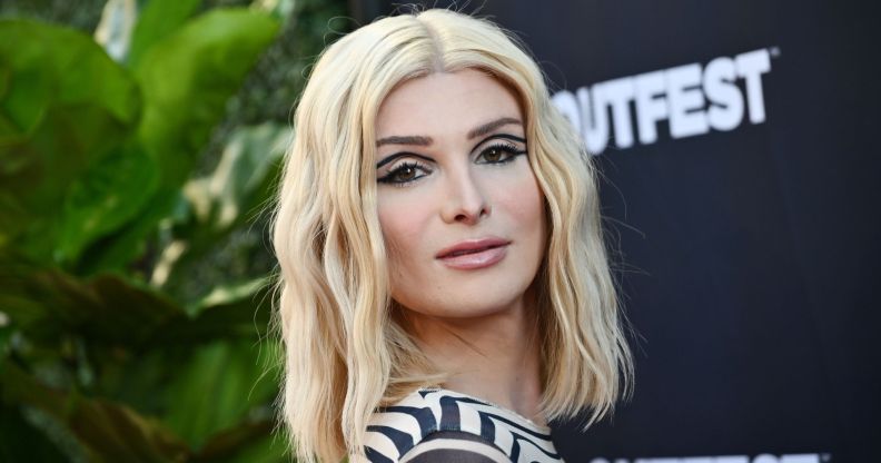 Trans influencer Dylan Mulvaney with blonde hair and black graphic eyeliner