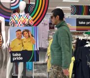 Man walks through a Target store display featuring LGBTQ+ Pride merch