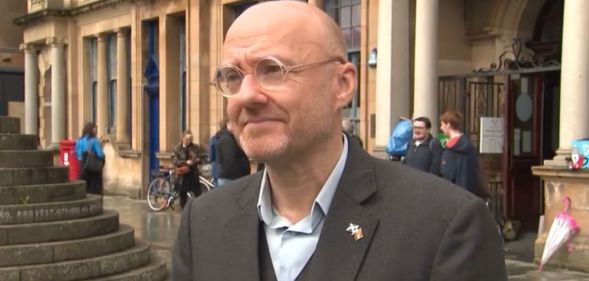 MSP Patrick Harvie looks at the camera during a live TV broadcast