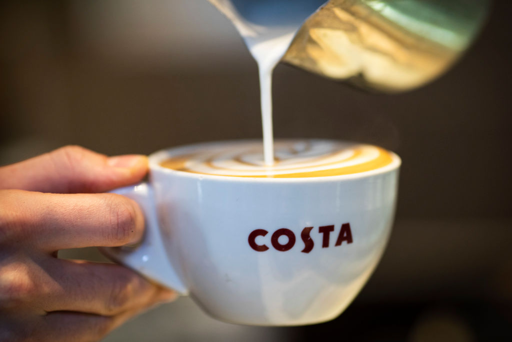 A latte is poured into a branded Costa Coffee mug in this arranged photo at a Costa Costa coffee shop on August 31, 2018 in London, England. 