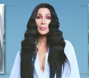 Cher with long black hair and a white shirt on the cover her her album 'Christmas'