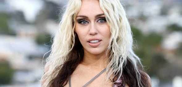 Miley Cyrus has poked fun at a viral photo with Demi Lovato and Taylor Swift, telling her fans they should've known she was bisexual.