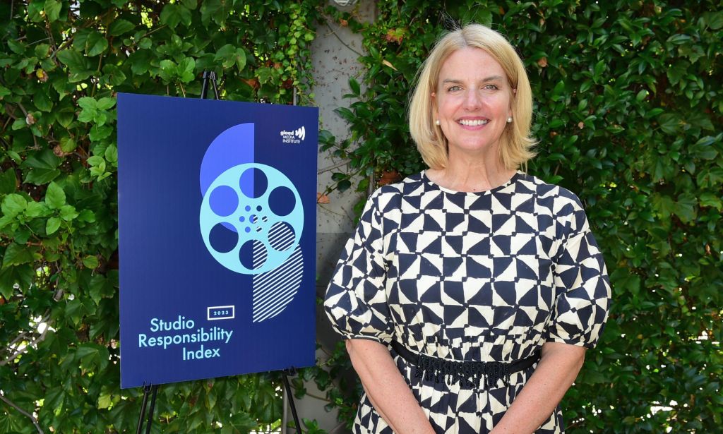 GLAAD CEO and President Sarah Kate Ellis, pictured next to a sign of the Studio Responsibility Index. 