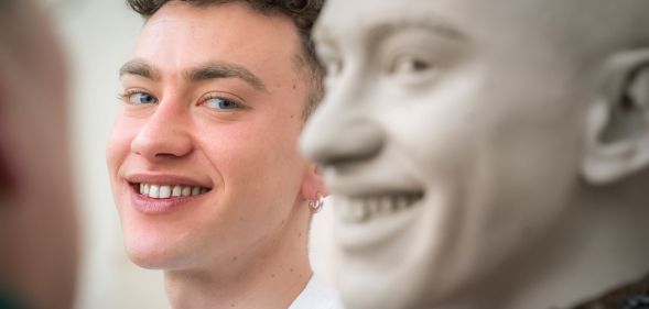 Olly Alexander with the head of his Madame Tussauds wax figure.