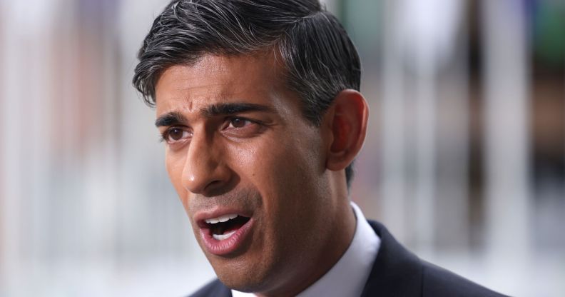 Rishi Sunak speaking at a conference.