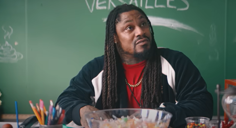 Marshawn Lynch reveals the emotional reason he decided to be in lesbian sex comedy Bottoms.