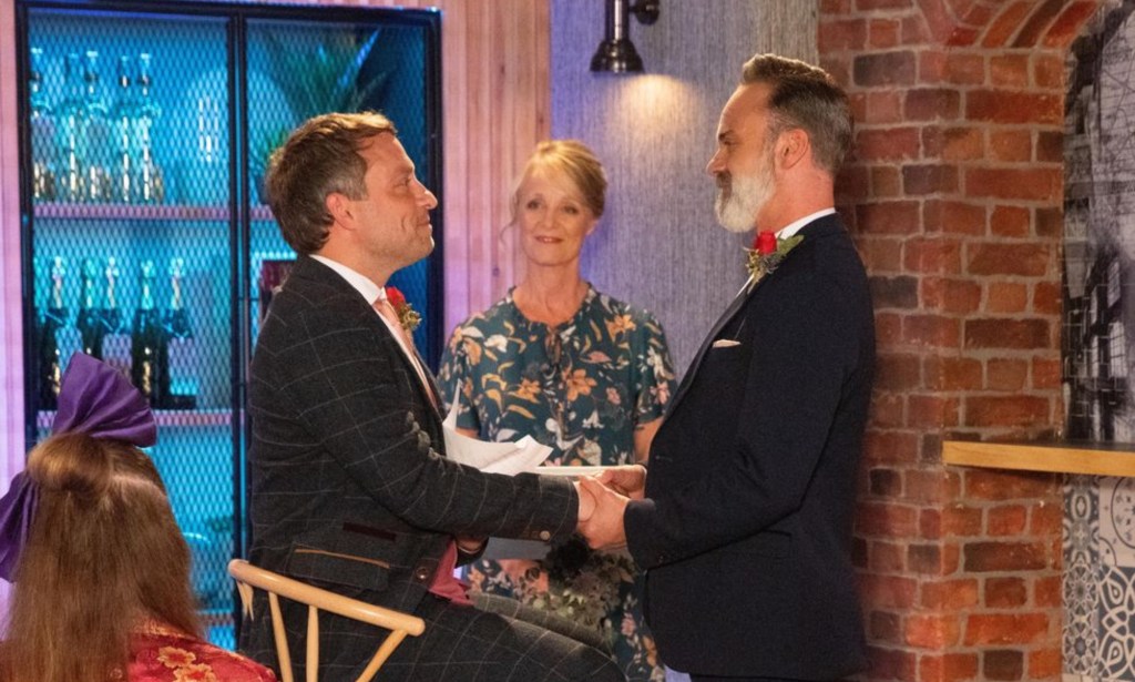 The happy couple exchange vows. (ITV)
