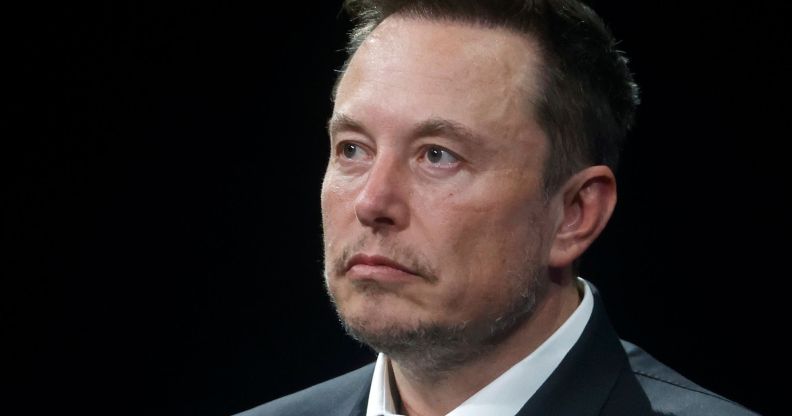 Elon Musk is seen wearing a white shirt and dark suit jacket. The X owner has hit out after several groups and LGBTQ+ activists have warned of rising levels of hate speech on the platform