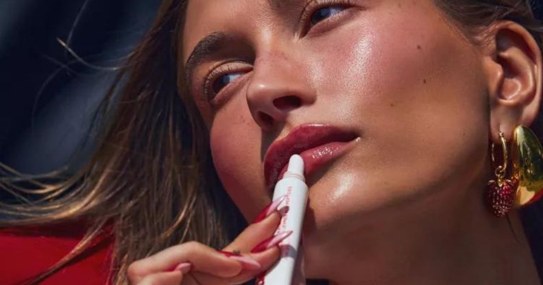 Hailey Bieber's Rhode Skin is re-stocking the sold out Strawberry Glaze Lip Treatment.