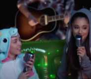 Miley Cyrus and Ariana Grande sing together.
