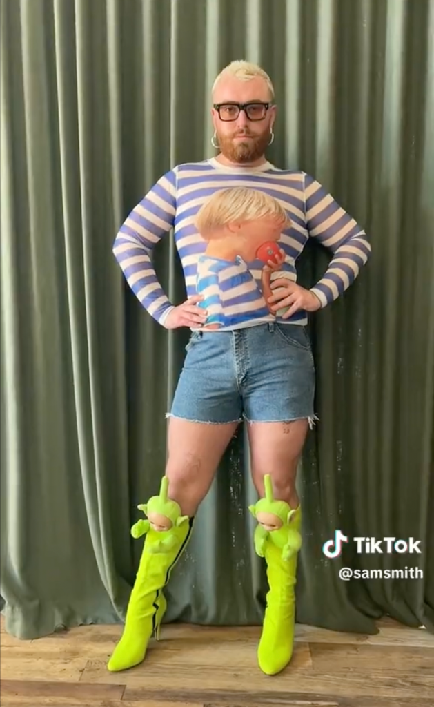 Sam Smith wears a striped top, denim shorts and Teletubbies boots in new TikTok.