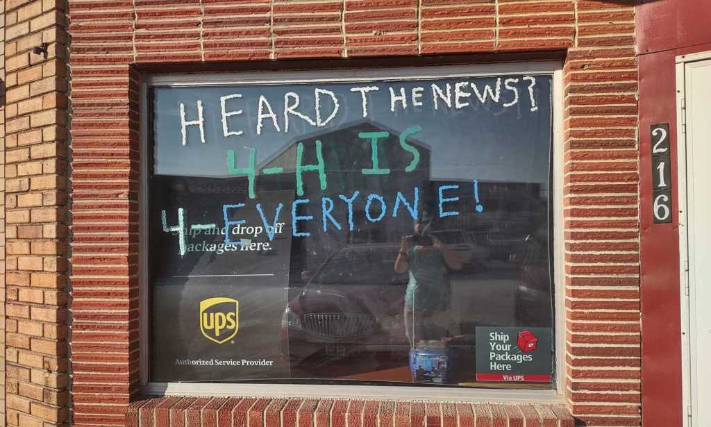 The 4-H club window display with the rainbow design removed.