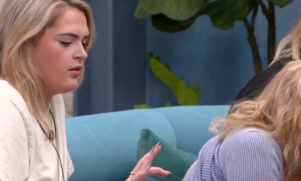 Big Brother: Hallie traces letters on Olivia's back.