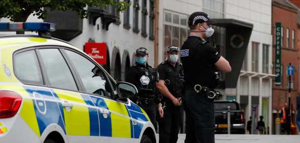 Police officers stand guard in the city centre during local lockdown on July 04, 2020 in Leicester, England.