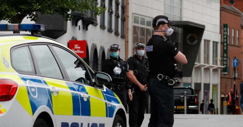 Police officers stand guard in the city centre during local lockdown on July 04, 2020 in Leicester, England.