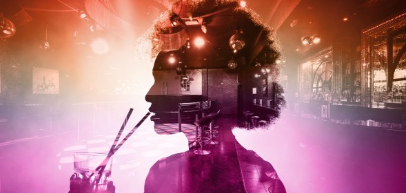 Silhouette of woman in empty bar