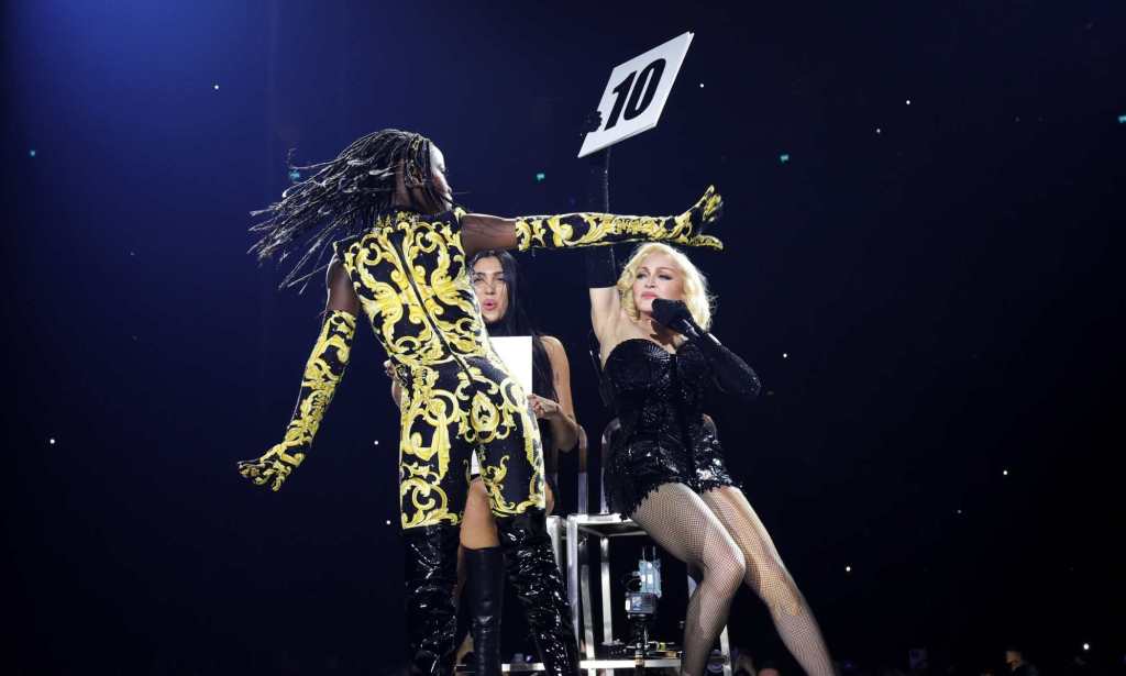 Madonna and her daughters Lourdes and Estere