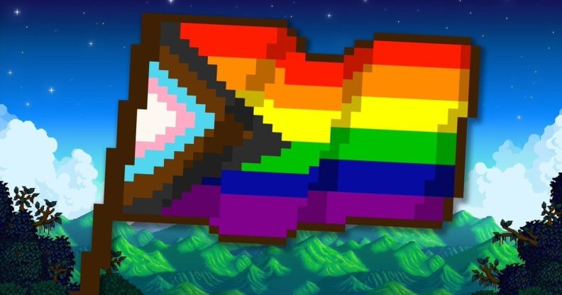 Image shows a pixellated LGBTQ+ flag, flown in the game Stardew Valley