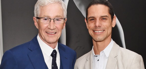 Paul O'Grady (L) with husband Andre Portasio (R).