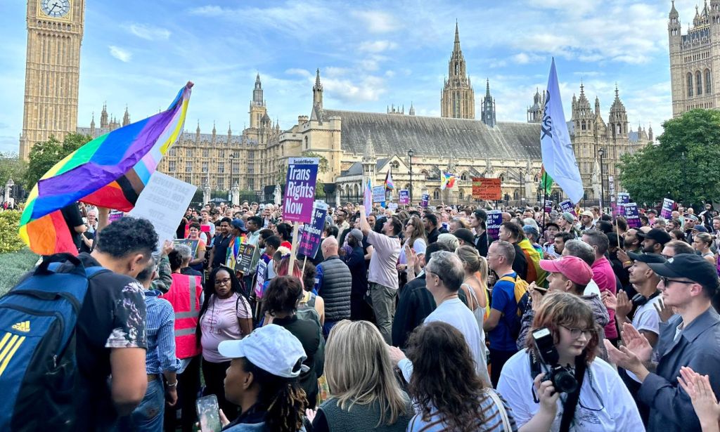Crowds gathering outside Parliament Square during the Stand Against Suella protest.
