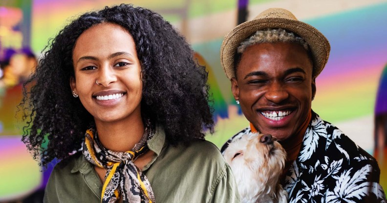 This is an image of two young Black people. The person on the left is a woman and she has long black hair. She is wearing a green top with a multicoloured scarf. The person on the right is male presenting, with a hat on and a floral shirt. He is holding a dog.