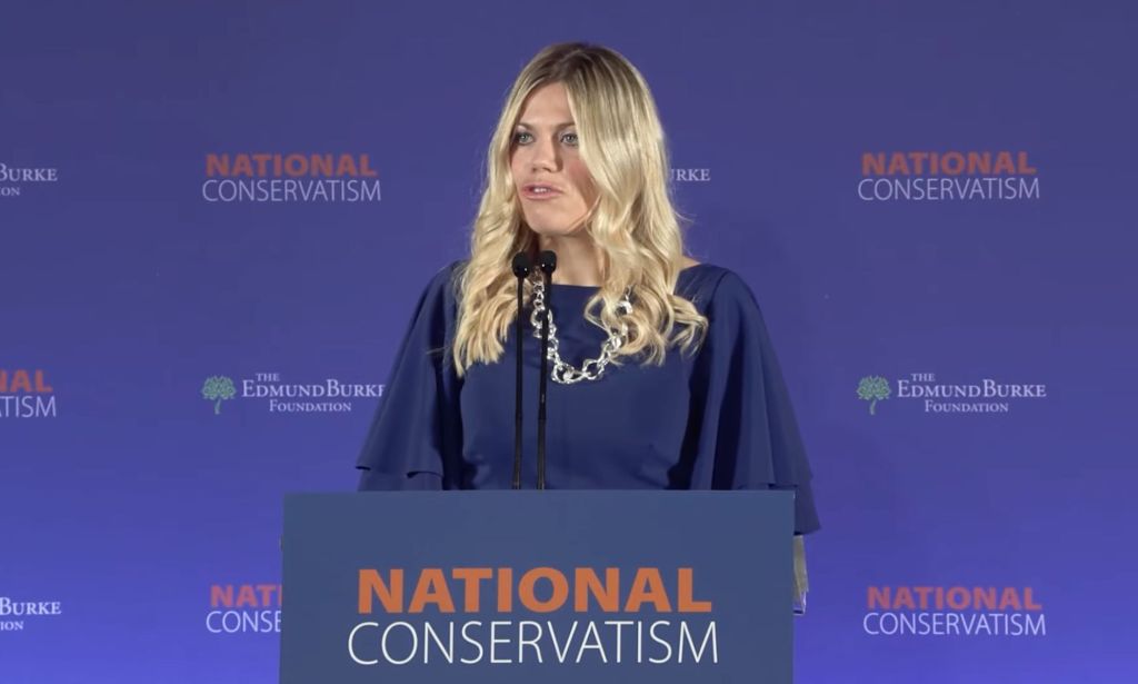 Tory MP Miriam Cates, who has been lambasted for her anti-trans views, wears a blue dress as she speaks at a National Conservatism event