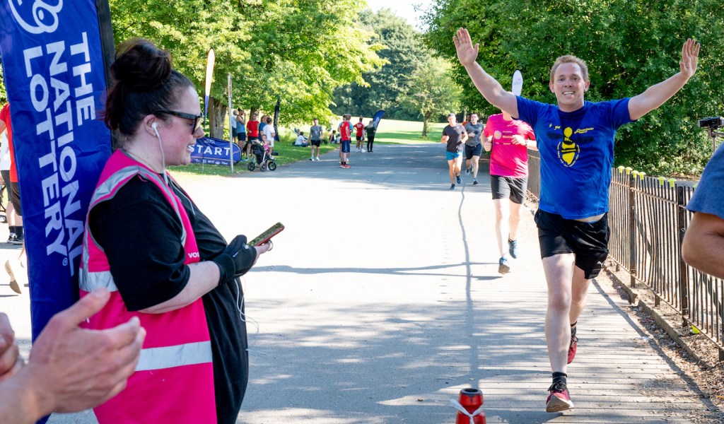 Runners enjoyThe National Lottery Park Run at Heaton Park on August 13, 2022 in Manchester, England. 
