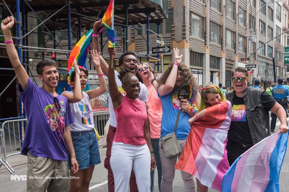 This is an image of a group of people at a Pride parade in New York City.
