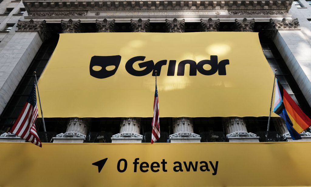 The Grindr logo on a billboard in Wall Street.