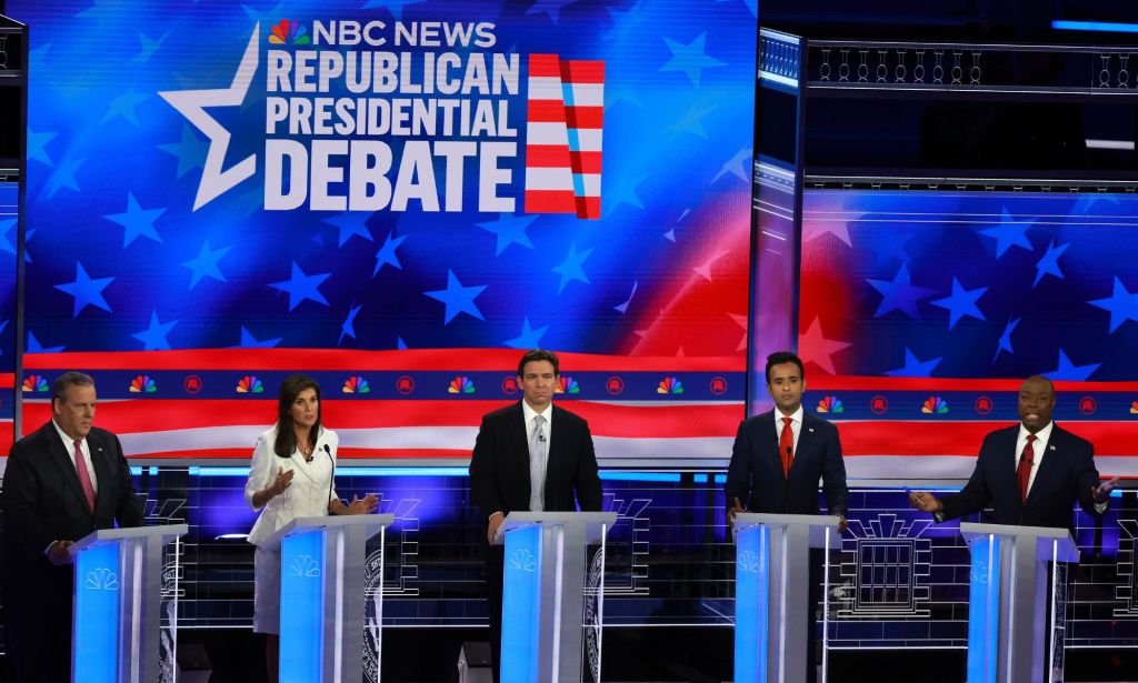 Republican presidential candidates stand at podiums ahead of the third debate, some have used anti-trans talking points at debates to bolster their support