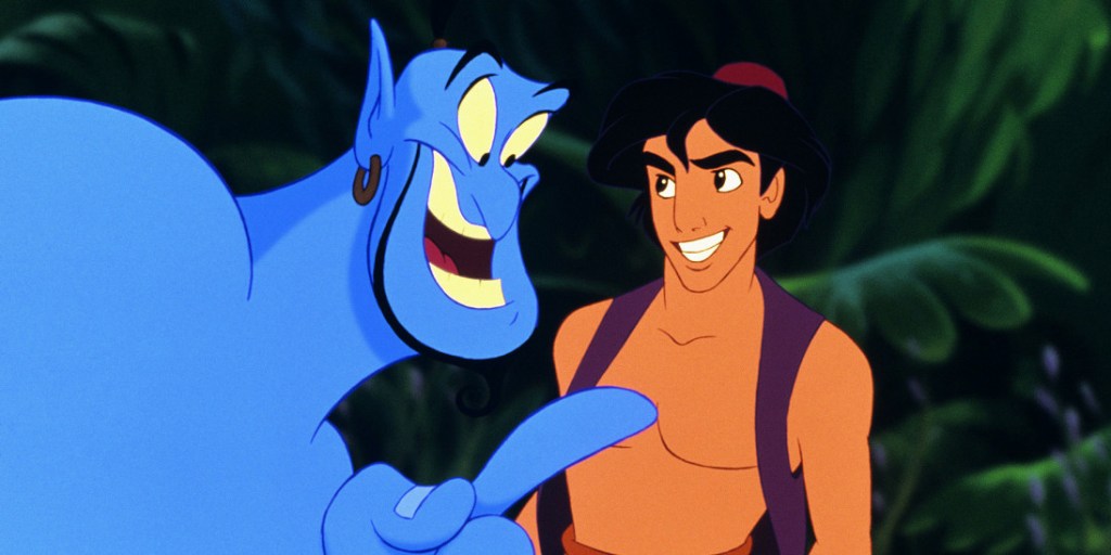 Image shows a scene from Disney's Aladdin, the cartoon version with Robin Williams playing the genie and speaking to Aladdin while wagging his finger. Aladdin is shirtless and wearing a purple fez and purple waistcoat. 