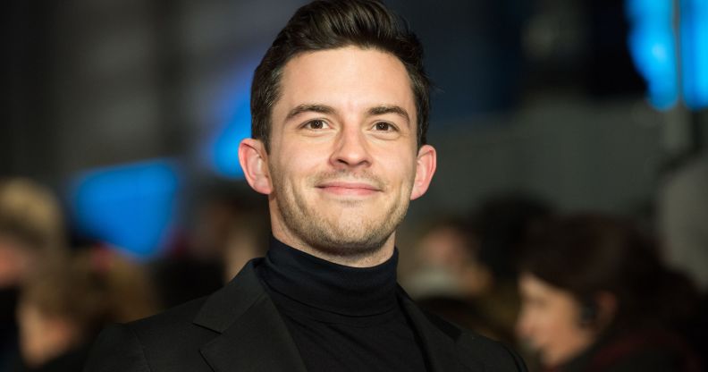 Jonathan Bailey in a black blazer and roll neck.
