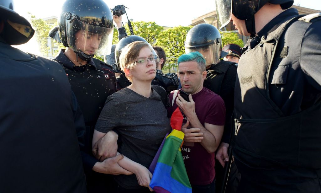 Russian riot police detain LGBTQ+ rights activists during a St Petersburg march in May 2019.