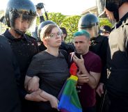 Russian riot police detain LGBTQ+ rights activists during a St Petersburg march in May 2019.