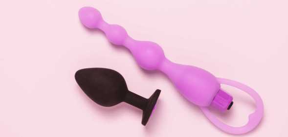 Butt plugs on a pink background.