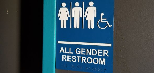 Stock image of a gender-neutral toilet door
