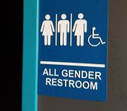 Stock image of a gender-neutral toilet door