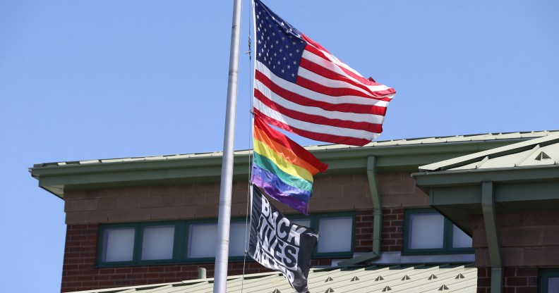 The ban prevents Pride and Black Lives Matter flags in schools and state buildings. (Photo by Jonathan Wiggs/The Boston Globe via Getty Images)