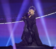 Two concertgoers in New York City are suing Madonna for starting her concert late. (Photo by Kevin Mazur/WireImage for Live Nation)