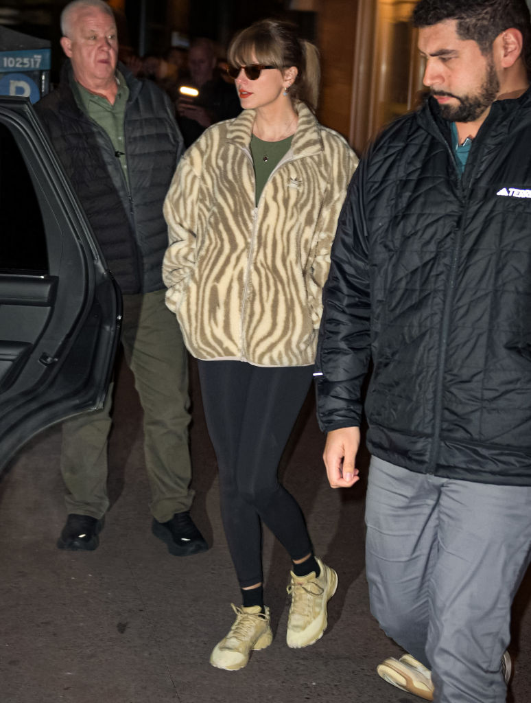 Taylor Swift wearing Beyoncé adidas sneakers.