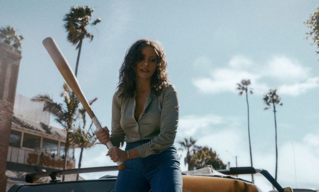Sofia Vergara as Griselda Blanco holding a baseball bat