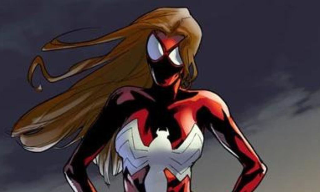 A woman in a red superhero costume stands with her hands on her hips.